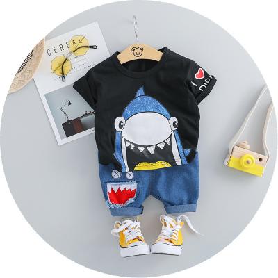 China Preppy style foreign covers European and American boys summer shark short-sleeved T-shirt + shorts suit children to trace customization for sale