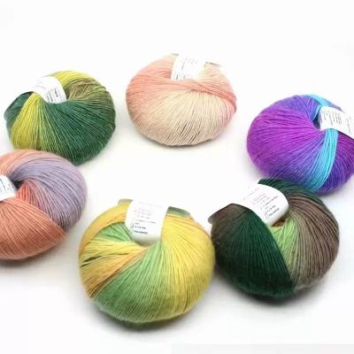 China rainbow mohair silk blend fancy colorful cake yarn hand knitting yarn in stock for sale