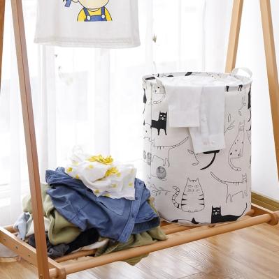 China Eco - Friendly Durable Laundry Hamper Bag Customized Cotton Fabric Laundry Bag With Strap for sale