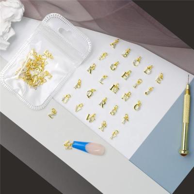 China Festival Holiday Finger Decoration Rain Alloy Diamond Gold Silver Romantic A-Z 26 English Letters Pendant Dangle Nail Art Dangle Charms Decorations for sale