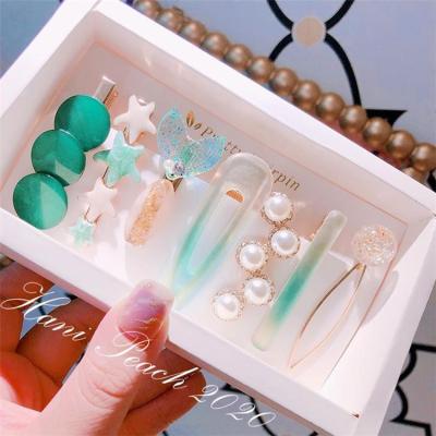 China Smart Casual Wholesale Korean Pearl Bangs Retro Mori Super Fairy Girl Hairpin Top Side Clip Headdress for sale