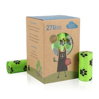 China Eco Friendly Cute Paw Print Rolls Poop Bag Pet Stocked Biodegradable Poop Bags For Dogs for sale