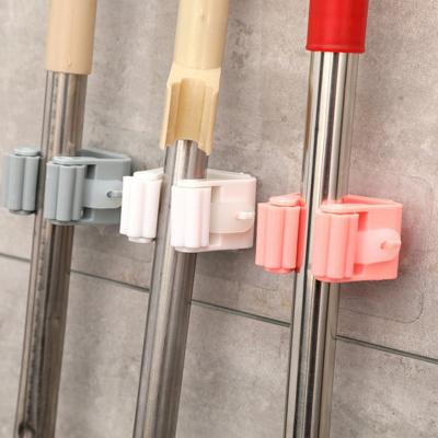 China Industrial Broom Racks No Punch Adhesive Wall Mounted Broom Broom Holders Wipe Holder Tool Holder Organizer Wall Shelf Rack Storage Hook for sale