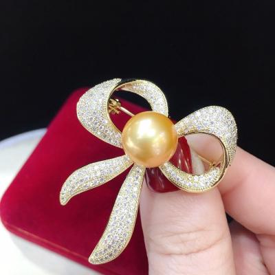 China Silver Plated Filigree Ribbon Pearl Brooches Ladies Gifts Big Wedding Gold Brass Bowtie Brooch Bowtie Brooch Pin Ladies Gifts for sale