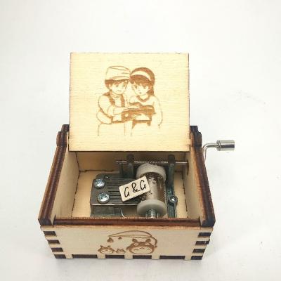 China Inexpensive Wooden Crank Music Box with Custom Melody for sale