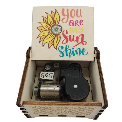 China Wooden Factory Custom Design New You Are My Sunshine Roll Up Music Box for sale