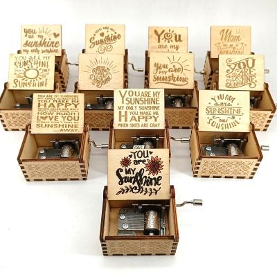 China Newly designed wooden mini music box you are my sunshine music box for sale