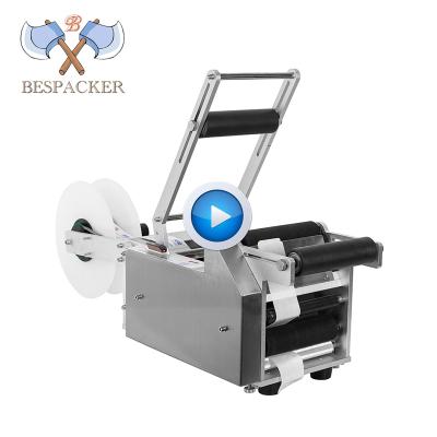 China Manual Bespacker MT-50 Beverage Round Sleeve Sticker Labeling Machine/Bottle Shrink Printer Labeling Machine for sale