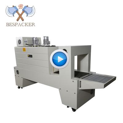 China Bespacker BSE-5040A CLOTHING Film Spray Auto Shrink Tunnel PE Wrapping Water Bottle Wrapping Shrink Sleeve Cup Packaging Machinery for sale