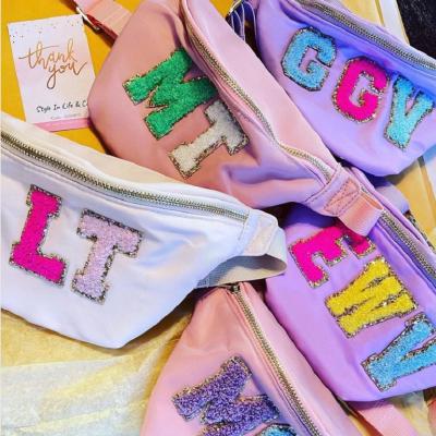 China Water Proof Stock Nylon Glitter Portable Personalized Letter Patches Custom Travel Women Girls Bridesmaid Birthday Pussy Packs for sale