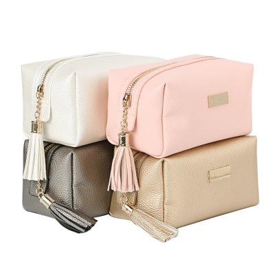 China Wholesale Fashion Travel Plain Elegant Korean Faux Leather Makeup Pouch Rose Gold Zipper Cosmetic Bag With Tassel for sale