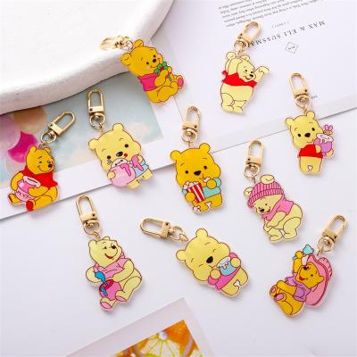 China Promotion Key Chain Gift Customized Creative Cute Bear Student Pendant Headphones Charm Gift Acrylic Key Chain for sale