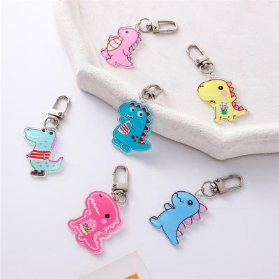 China Promotion LOGO Fashion Gift Customized Cute School Bag With Acrylic Dangle Simple Cartoon Glitter Key Chain for sale