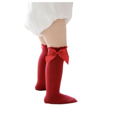 China Custom QUICK DRY Baby Bangs Princess Knee High Christmas Knee Sock Winter Bowknot Decor for sale