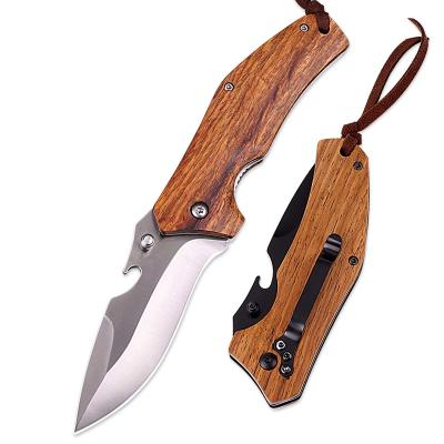 China 2022 Exquisite And Practical New Style Wooden Handle Folding Pocket Knife Survival Outdoor Camping Tactical Hunting Knife With Bottle Opener for sale