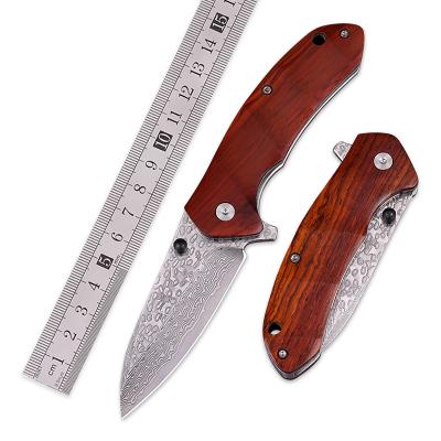 China High grade manual wooden handle customization Damascus steel handmade knife 73 layers camping folding hunting knife for sale