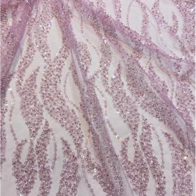 China Other Lace 2021 New Arrival Tulle Lace Textile Fabric Haute Couture Luxury Elegant Wedding Beaded Dubai Market Wholesale for sale