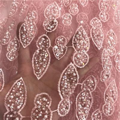 China The OTHER beaded lace fabric wedding 2020 latest lace dress fabric cheap elegant multicolor sequine beaded lace fabric for sale