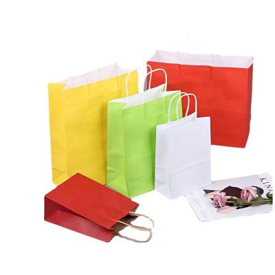 China Cheap Recycled Materials Flat Bottom Colorful Paper Bags With Twisted Twine Handle For Free Sample for sale