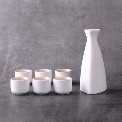 China Sustainable White Wholesale Sake Bottle And Six Cups Ceramic Japanese Wine Set for sale