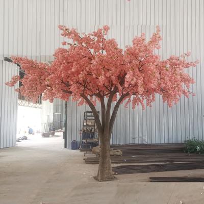 China New Design Wedding Decor Minimalist Fake Sakura Blossom Tree Cherry Trees Arched Artificial Cherry Blossom Tree for sale