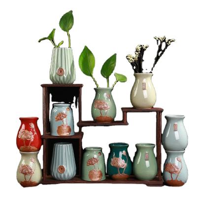 China Modern Home Decoration Flower Vase Essential Oil Small Ceramic Vase for Home and Office Aromatherapy Flower Diffuser Bottle for sale