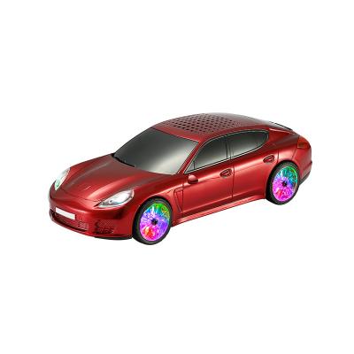 China Wireless Charger For Mobile Phone HS-C103 Fashion Styling Car Toy Mini Portable Outdoor Kids Wireless Speaker With Flash Light On Wheel for sale