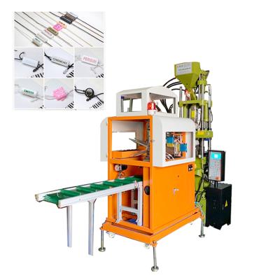 China Hang Tag Seal Plastic Lock VERTICAL Twine Station Vertical Injection Mold Making Machine for sale