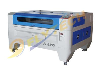 China bajo laser costo 1390 cortadora de madera con el envío libre en venta