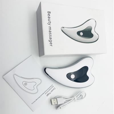 China 2021 new product gua sha logo massager gua sha scraper electric face massager with factory price for sale