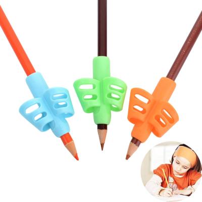 China Topper Pencil Grip Training and Cultivate Kids Pencil Pen Writing Aid Grip Support Posture Correction Tool for sale