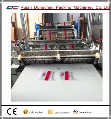 China Plastic 2 Lines Double Sensors Square Shape Printed Plastic Bag Making Machine for sale