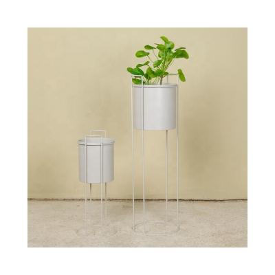 China Minimalist White Metal Planter Stand For Flower Indoor Home Decor Solid Planter Box With Raised Base for sale