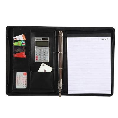 China Durable leather bound agenda notebook with calculator and zipper for sale