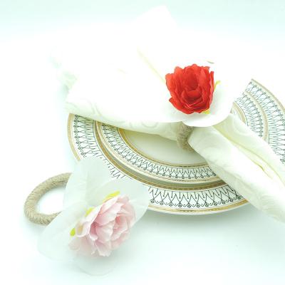 China Sustainable High End Wedding Banquet Table Decorated With Flower Plastic Napkin Ring for sale