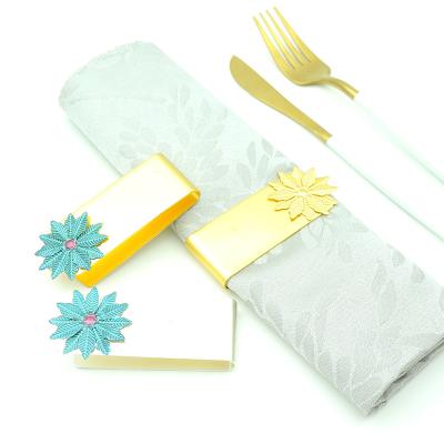 China Banquet Sustainable Top Wedding Gold And Silver Exquisite Flowers Napkin Clip Metal Colored Napkin Ring for sale