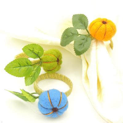 China High-end Sustainable Metal Wedding Banquet Table Decoration Halloween Pumpkin Smile Face Napkin Ring for sale