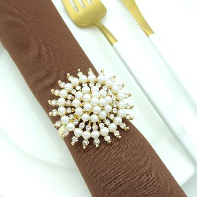 China Sustainable Refined Pearl Flower Decorations For Banquet Advanced Wedding Gold And Silver Metal Napkin Rings for sale