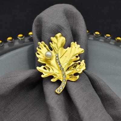 China Banquet Decoration Sustainable Top Wedding Gold And Silver Metal Leaf Maple Leaf Napkin Ring for sale