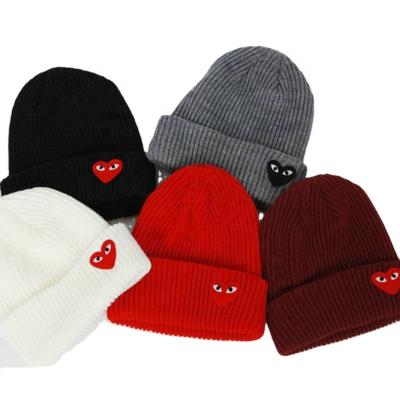 China Custom Designer JOINT Acrylic High Quality Bulk Sports Ladies Winter Fashion Hat Embroidered Hats Knitted Beanie For Women for sale