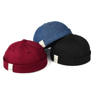 China JOINT Hot Selling Non Brim High Quality Brimless Custom Hats Caps With Buckle for sale