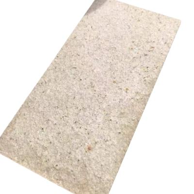 China Modern Chinese Golden Yellow Rusty Granite Cobblestone Wall Stone for sale