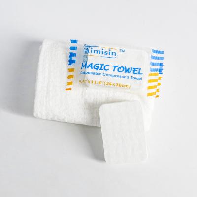 China Hot Selling Disposable Nonwoven Compressed Facial Magic Tissue Child Safe Custom Candy Towel for sale