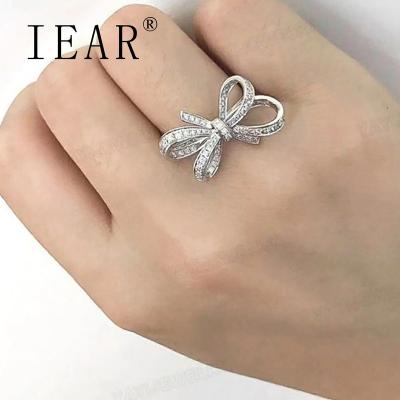 China IEAR TRENDY gold plated jewelry supplier with good service copper rings bow tie fidgety person ring zircon rings for sale