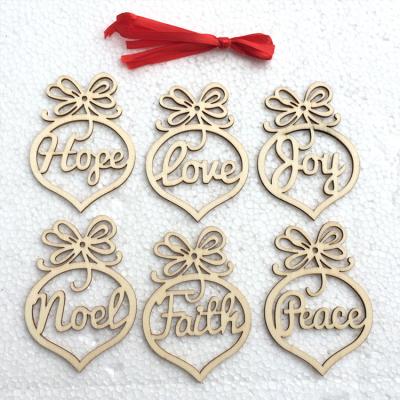 China 2021 Hollow Carved Wooden Christmas Tree Ornaments Letter Decoration Eco-friendly Christmas Supplies For Christmas Gift for sale