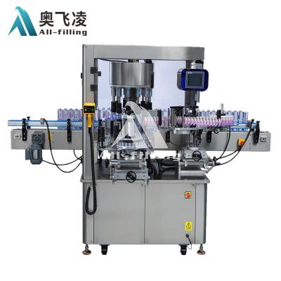 China One Side Labeler High Speed ​​Adhesive Rotary Stick Labeling Machine For Bottles for sale