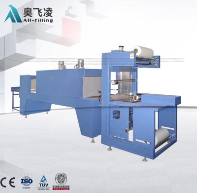 China High Speed ​​Semi-automatic PE Film Shrink Packaging Machine Sleeve Wrapping Machine With Heating Tunnel for sale