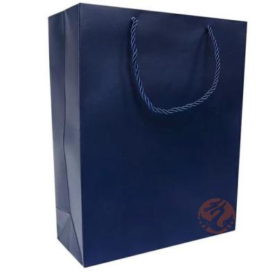 China New Portable High-end Portable Environmentally Friendly Shopping Bag Clothing High-end Paper Bag for sale