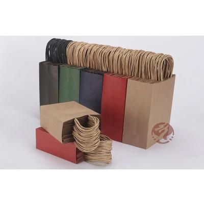 China Factory Wholesale Custom Recycled Paper Bags Portable Packaging Shopping Bags Environmentally Friendly for sale