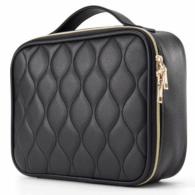 China Waterproof Black Leather Quilted Portable Cosmetic Organizer Pouch Toiletries Case Fashion PU Makeup Bag Storage Box Travel Case With Divider for sale